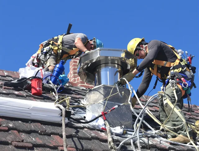 Protective chimney cap installed by Bloomfield Chimney Sweep in Bloomfield, CT