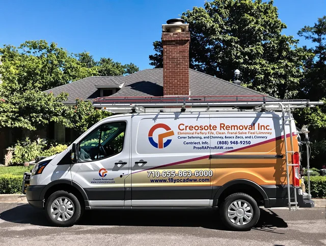 Bloomfield Chimney Sweep technician removing creosote safely in Bloomfield, CT